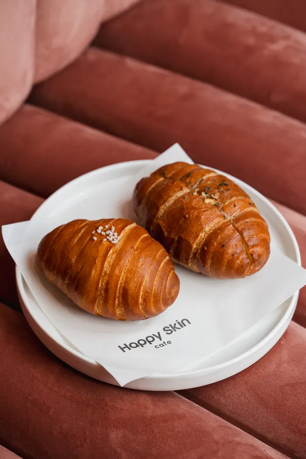 Two croissants on a plate