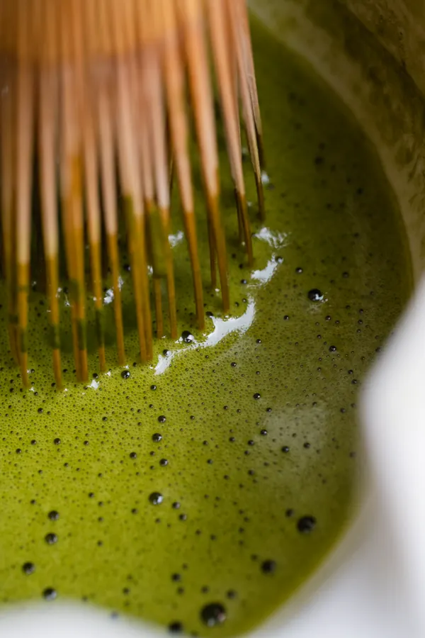 Whisk frothing matcha