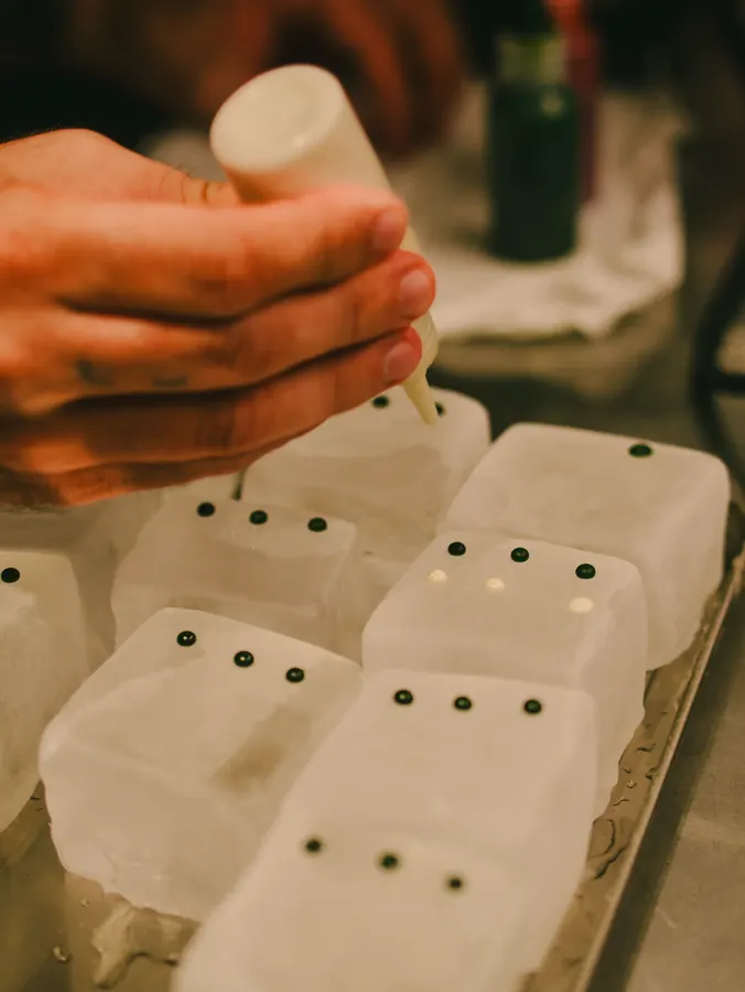 Hand piping filling into square moulds