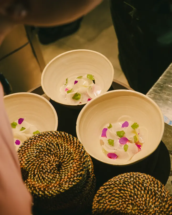 White bowls garnished with flowers