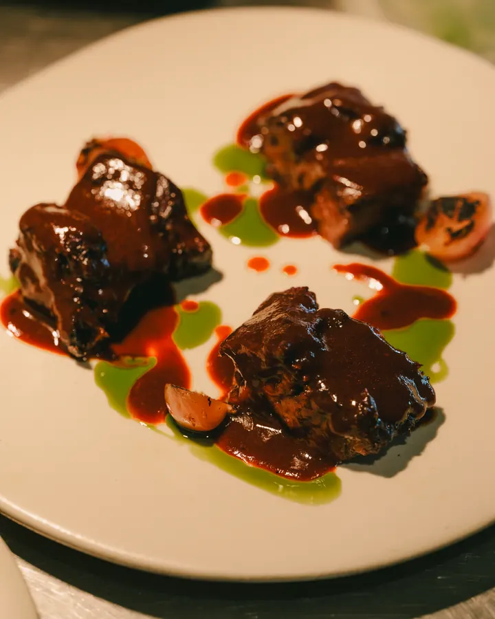 Braised meat with green and red sauces