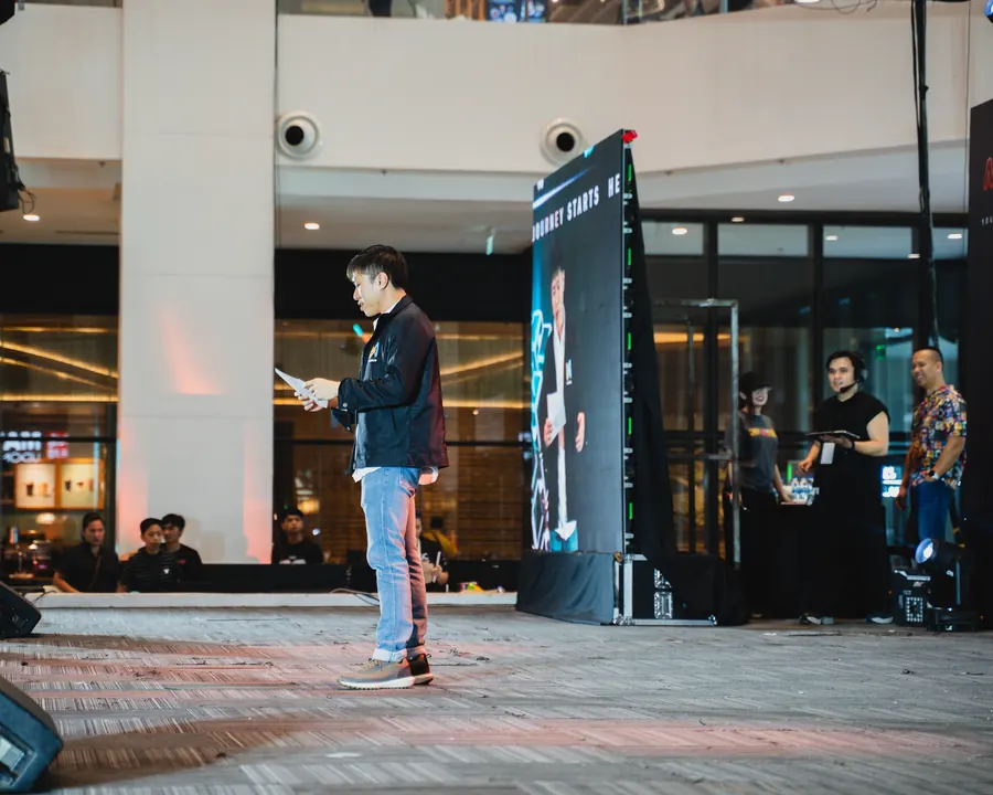 Speaker presenting on stage