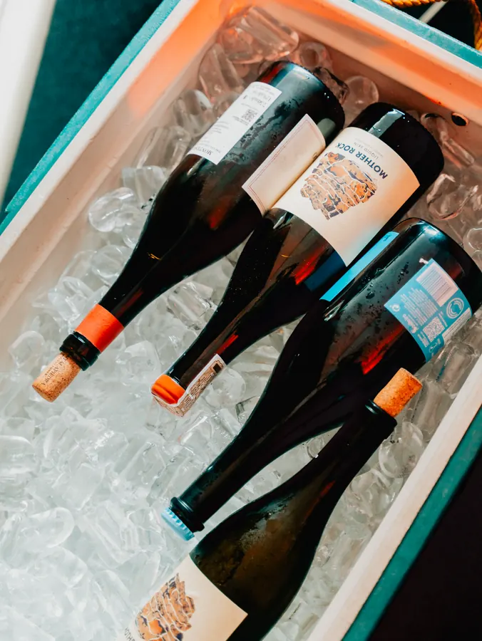 Wine bottles on ice