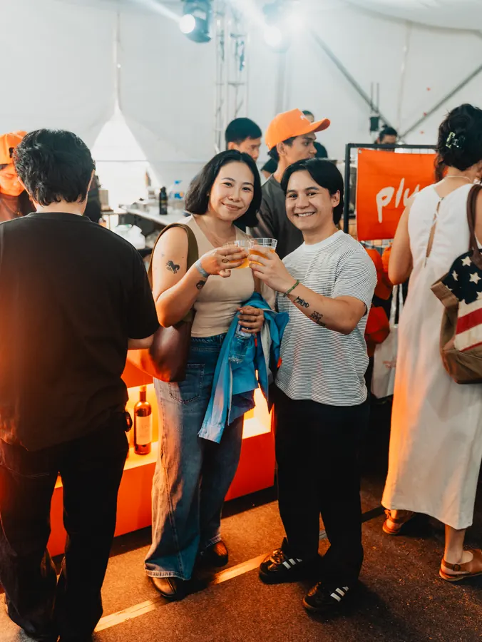 Guests laughing at the booth