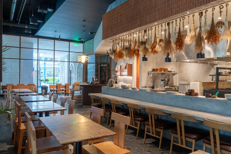 Long view of the counter seating and dining room