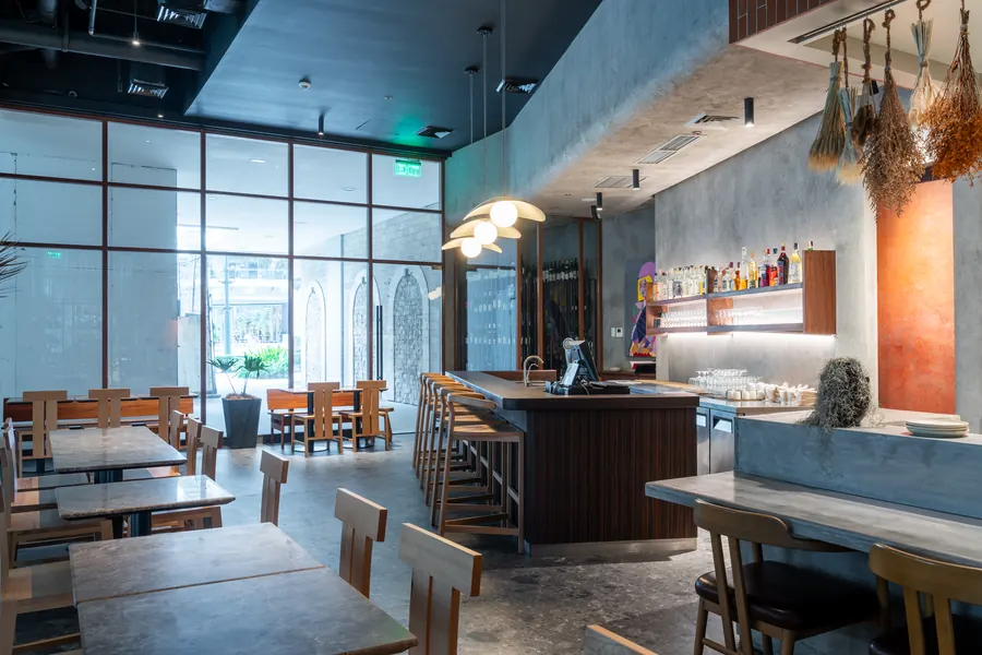 Dining room with the bar in the background