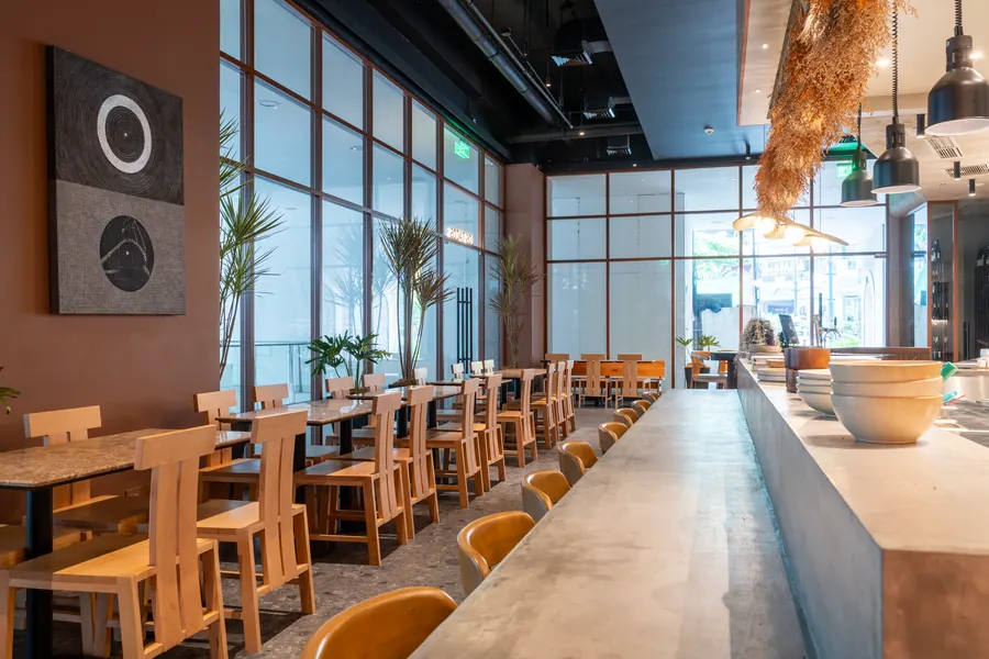 Long communal counter by the windows